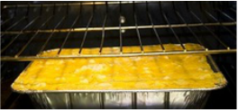 pan of cheesy, creamy chicken casserole ready to take out of the oven
